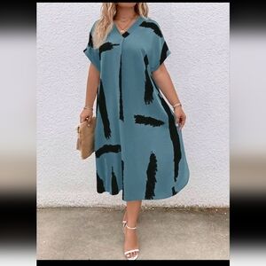 Lovely ladies blue and black dress , very roomy and light weight,  comfortable